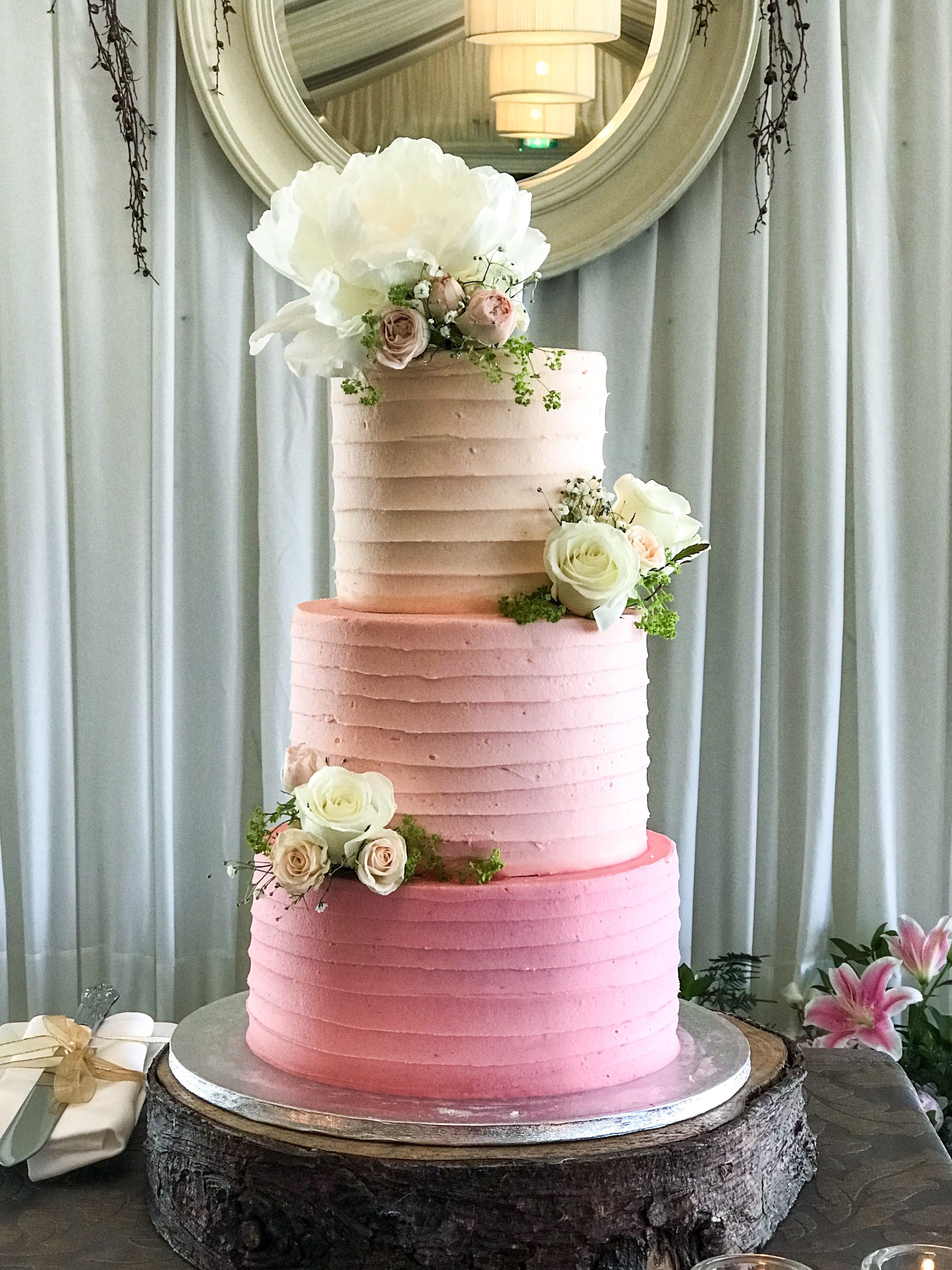 Pink Ombre Buttercream Iced Wedding Cake Decorated With Pretty